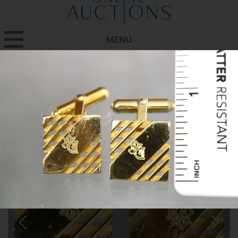 Authentic Christian Dior Cuff Links in a gift box.